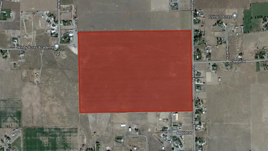 Photo from Google Earth showing Sunset Acres from above. A red shape outlines the exact area the subdivision occupies.